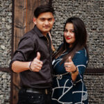 Love Story Indian Couple Posed Outdoor Shows Thumb Up 1